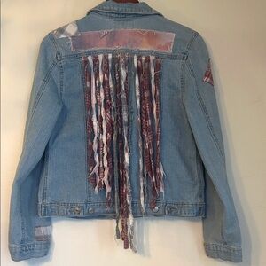 Upcycled flannel patched fringe back jean jacket